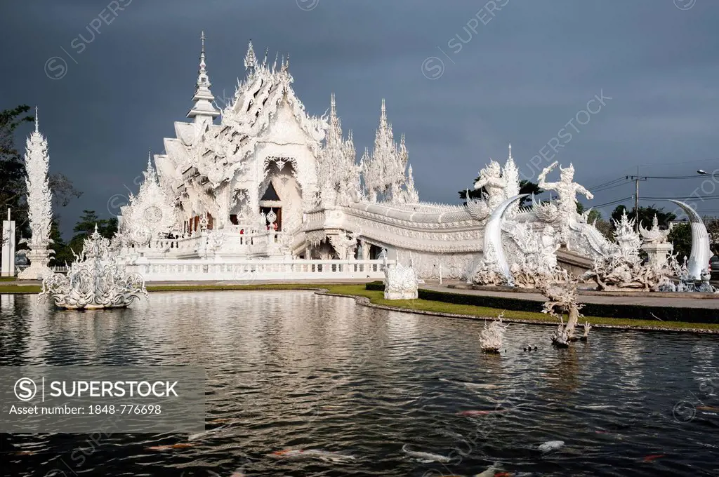 Wat Rong Khun temple or The White Wat, a Buddhist-Hindu temple by architect Chalermchai Kositpipat