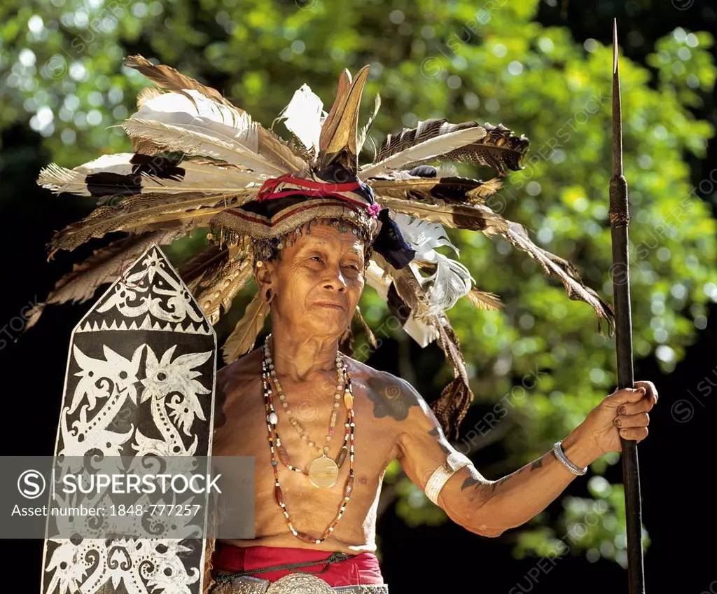 Head hunter of the ethnic group of the Iban people with a spear, Skrang River