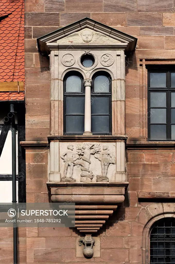 Bay window with a relief of the Fall of Man, on the facade of Tucher Mansion, built 1533-1544