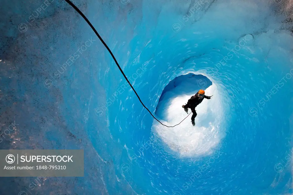 Ice climbing in an ice cave or glacier cave, glacier crossing, Grey Glacier