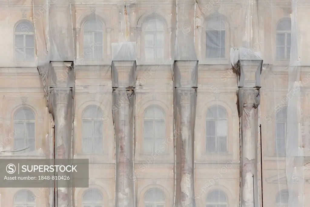 Facade of a historic building shrouded with tarpaulins during renovation, Mariánské Lázne, Karlovy Vary Region, Bohemia, Czech Republic