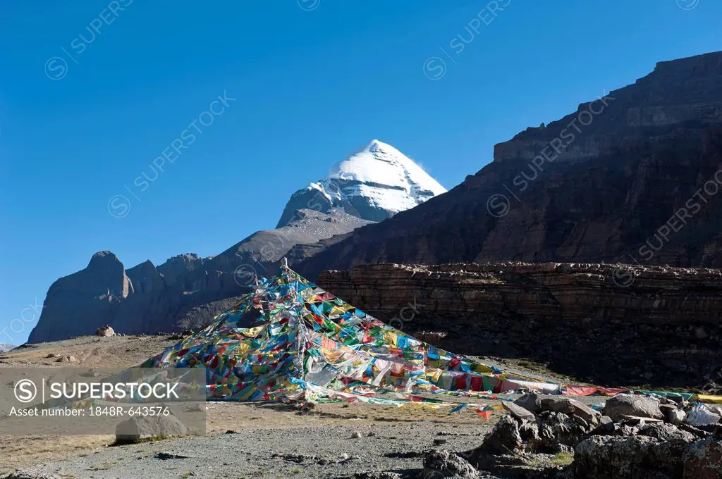 Tibetan Buddhism, colorful prayer flags, Tarboche flagpole, snow-covered holy Mount Kailash, Gang Rinpoche mountain, pilgrims' path, Kora pilgrimage, ...