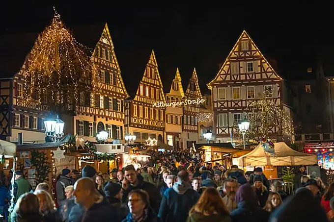 Crowds at Christmas market at night, Calw, Germany, Europe