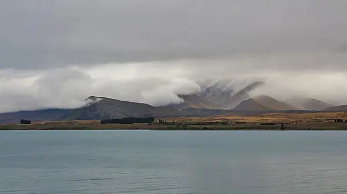 Popular travel destination in New Zealand. Moody sky over Mt Dobson