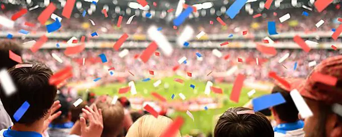 Fans in the stadium & confetti