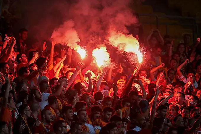 Fans of Galatasaray Istanbul cheer on their team during a friendly game against SK Rapid Vienna, Ernst-Happel-Stadium, Vienna, Austria, Europe