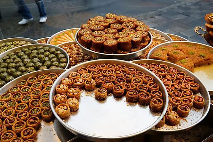 Baklava and other Turkish sweets in the shop window of Hafiz Mustafa, Istanbul, Turkey, Europe, Istanbul, Istanbul Province, Turkey, Asia