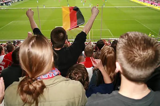 Fans at the Allianz Arena football stadium, Munich, Bavaria, Germany, Europe