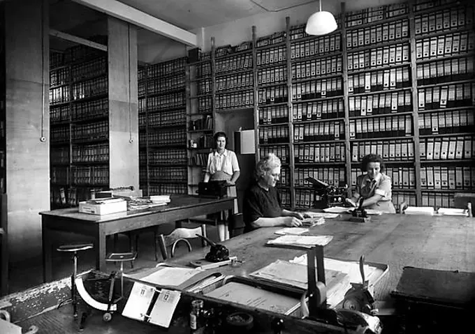 Historic photograph, three women working in an office