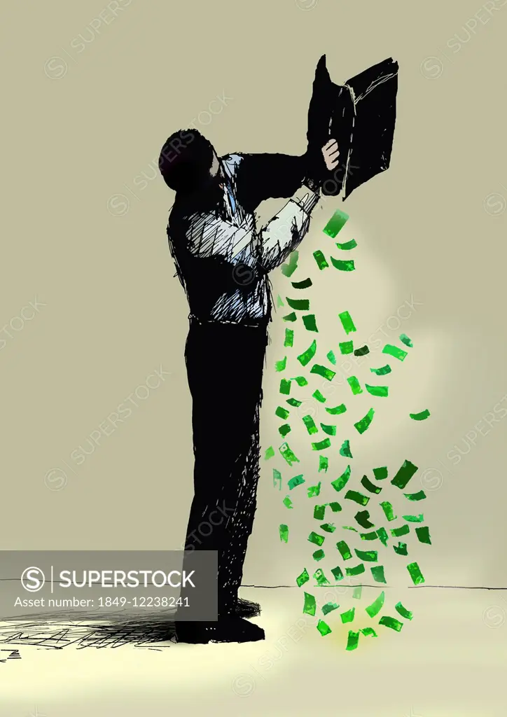 Businessman tipping out money from briefcase