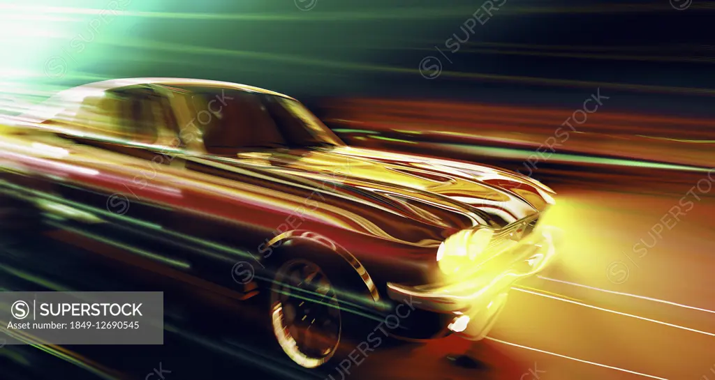 Shiny car moving at speed at night