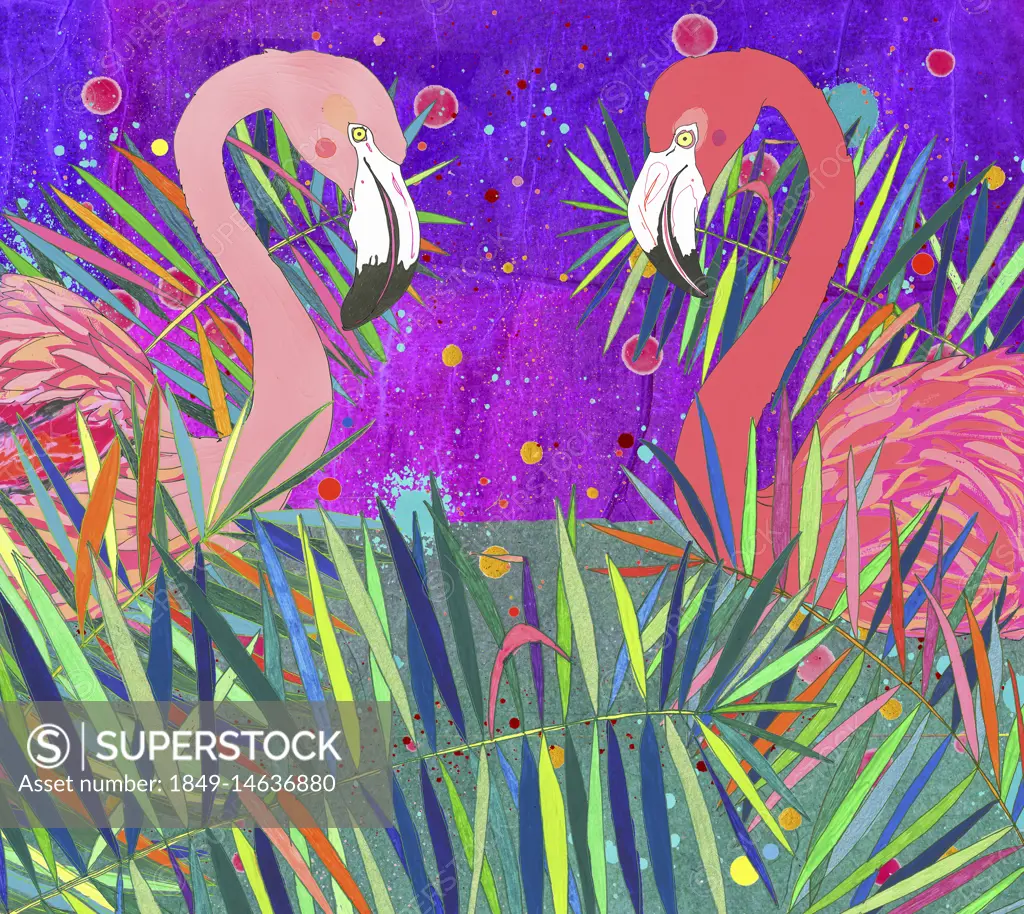 Two flamingos looking at each other in brightly coloured leaves