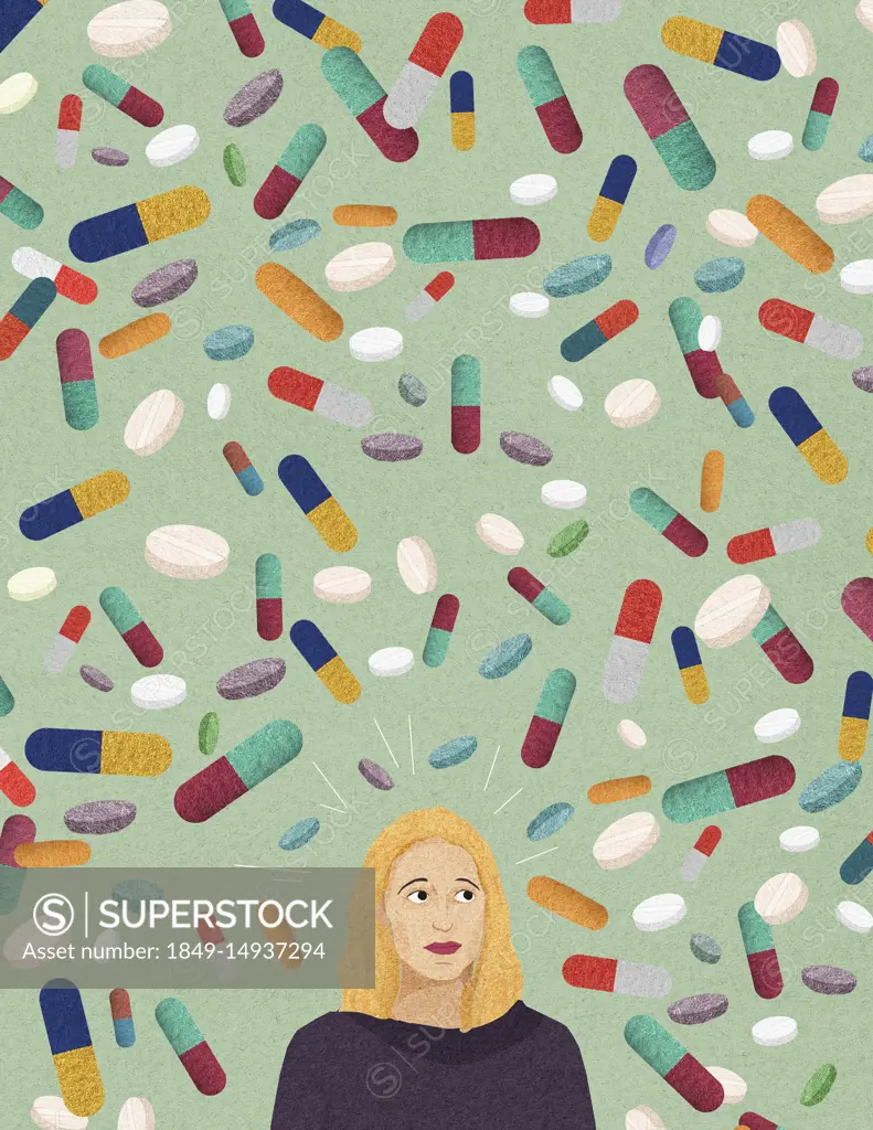 Anxious woman surrounded by lots of pills