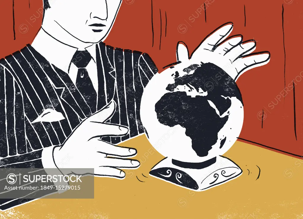 Businessman forecasting with globe crystal ball