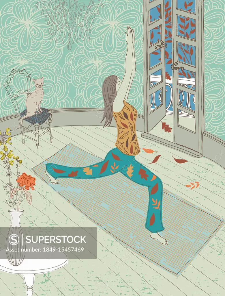 Woman doing yoga in lounge in autumn