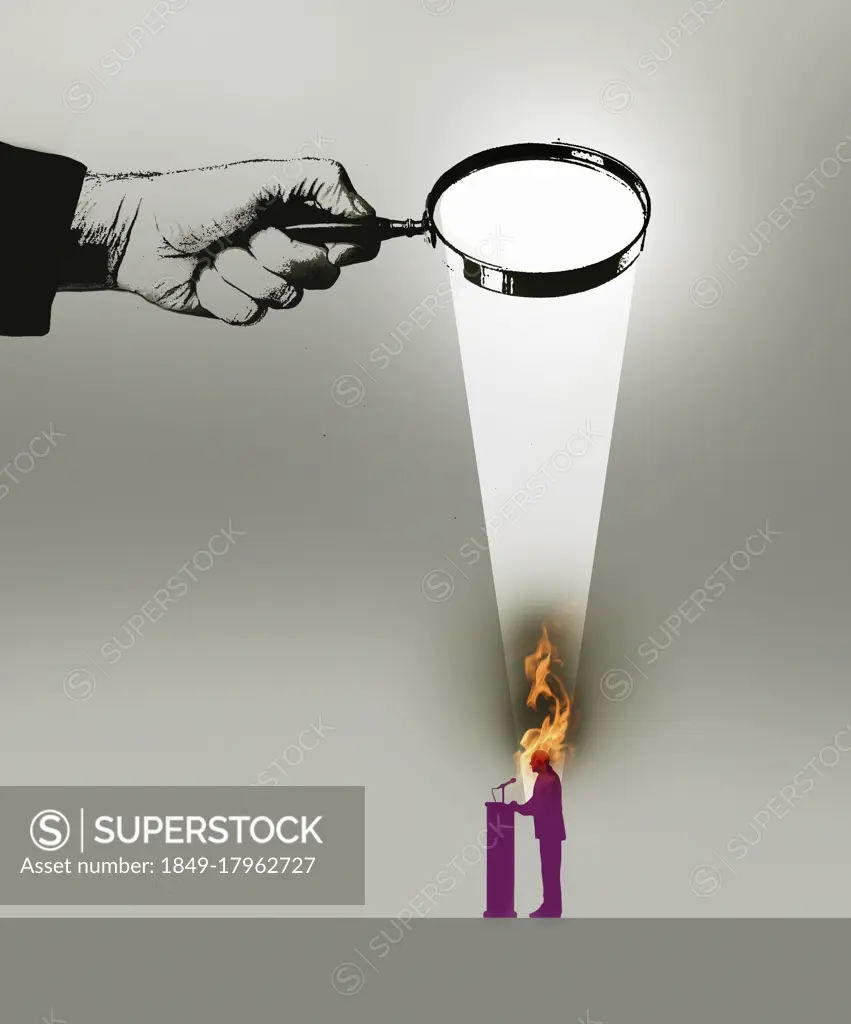 Politician burning under rays of magnifying glass