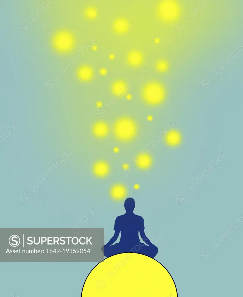 Bright lights above man meditating