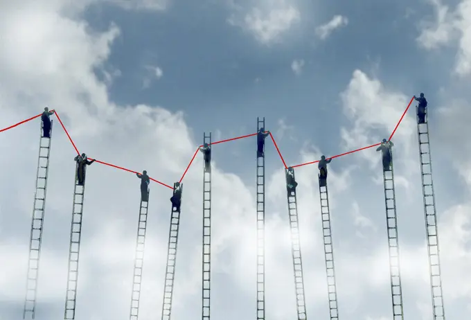 Lots of businessmen standing on top of ladders holding up line graph in the sky