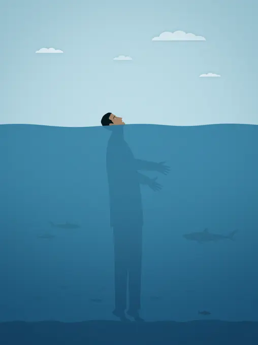 Businessman on tiptoes on seabed with face above water