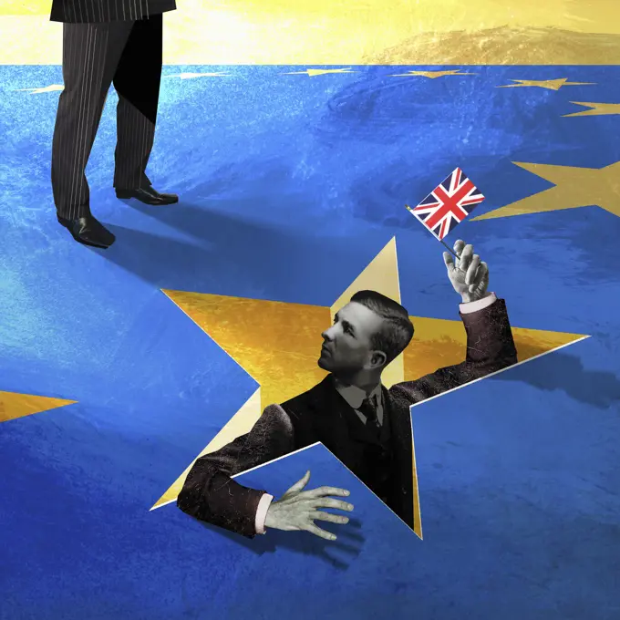 Businessman waving Union Jack in a hole in European Union flag