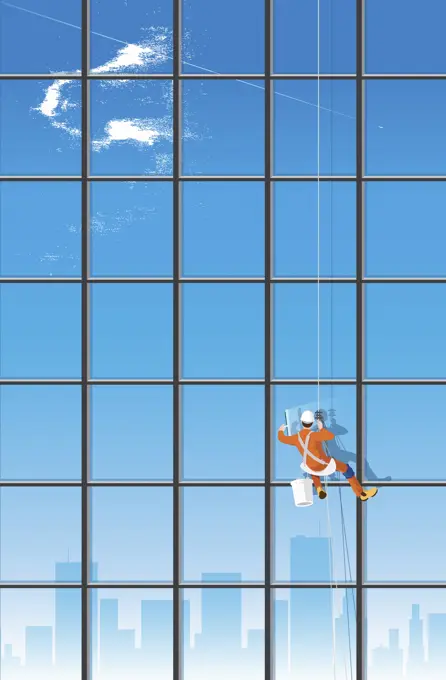 Window cleaner washing skyscraper windows