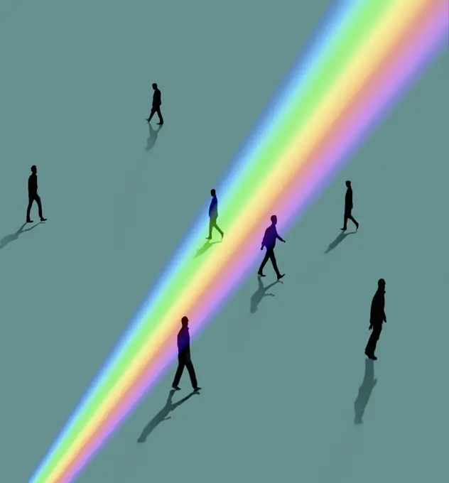 Silhouettes of people walking through rainbow light