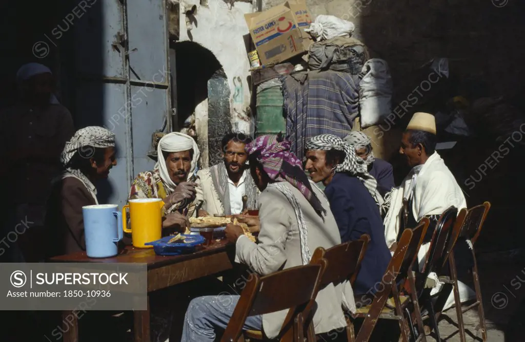 Yemen, Sana, Group Of Men Eating Breakfast Together.