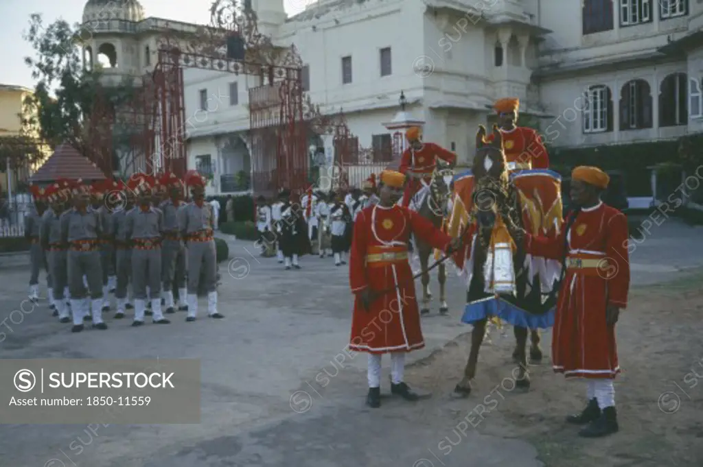 India, Rajasthan, Udaipur, 'The City Palace Complex.  Shambhu Niwas Palace, Present Residence Of The Maharana Or Rajput Clan Head.  Courtyard With Parade Of Private Guards And Horses.'