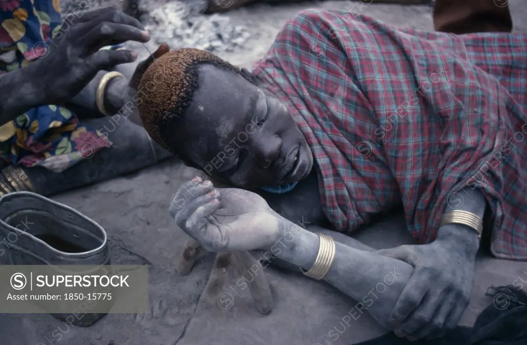 Sudan, People, Men, Dinka Man Having His Hair Dyed Using Cattle Urine.