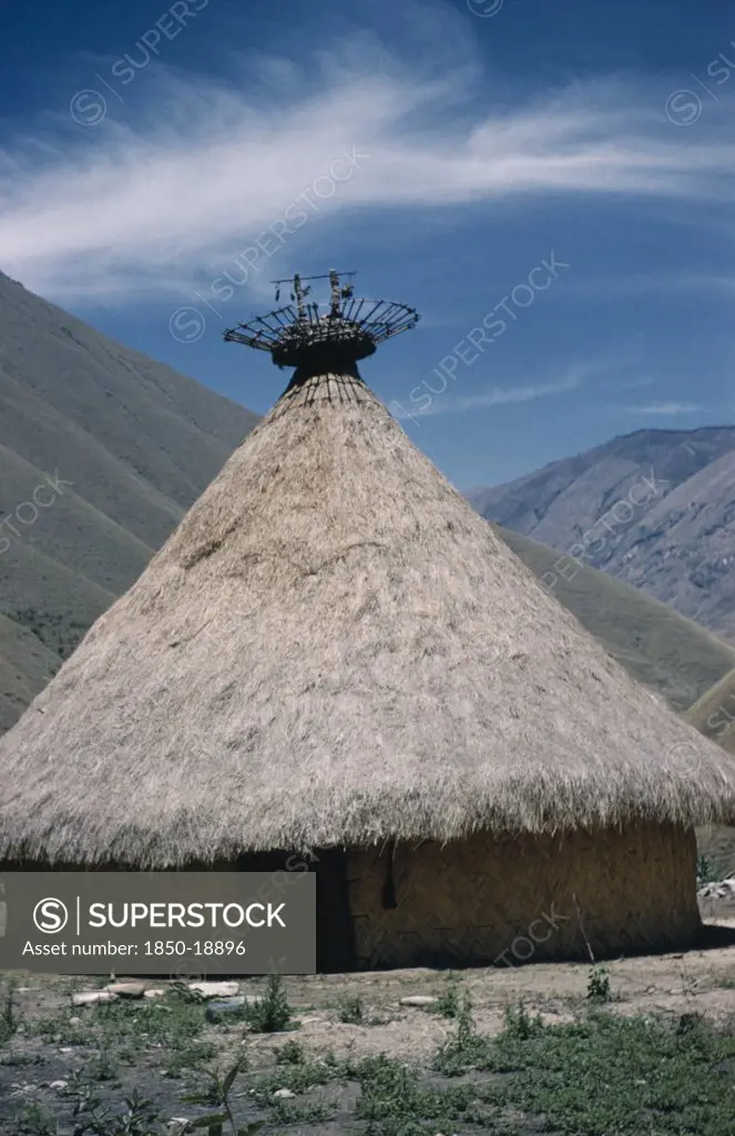 Colombia, Sierra Nevada De Santa Marta, Kogi Tribe, 'Kasiquial, A Ritual Meeting Centre For Kogi Mamas  / Priests. Sacred Potsherds In Rack At Apex Of Conical Thatched Roof Indicate This Is A Nuhue / Temple.'