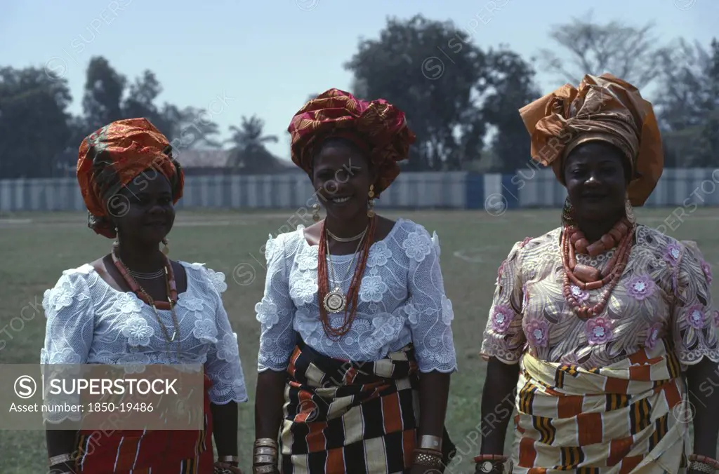 Nigeria, People, Three-Quarter Portrait Of Three Ibo Women Dressed In Traditional Clothes For Special Occasion.