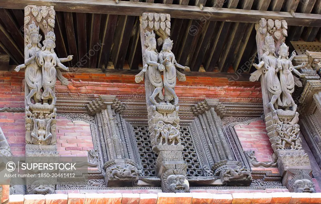 Nepal, Kathmandu, Durbar Square, Erotic carvings on roof supports of Jagganath Temple.