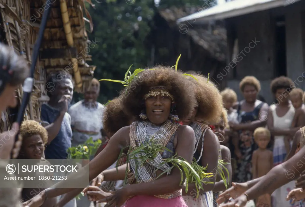 Pacific Islands, Melanesia, Solomon Islands, 'Malaita Province, Lau Lagoon, Foueda Island.  Girls Performing Wedding Dance Wearing Multi-Strand Shell And Coral Necklaces.'