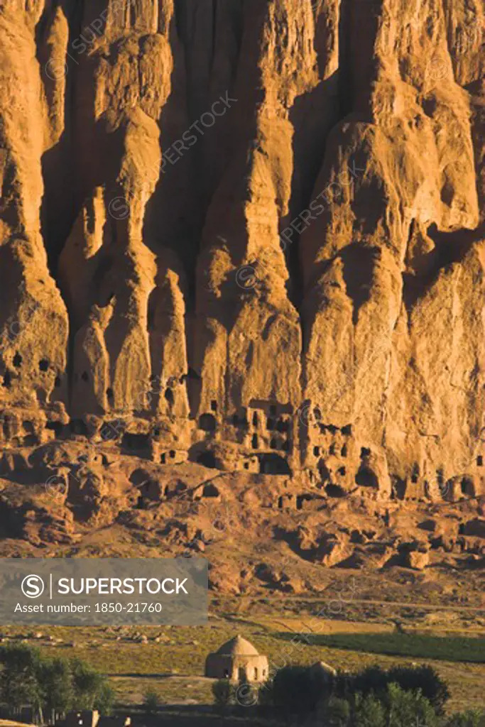 Afghanistan, Bamiyan Province, Bamiyan, Tomb At Base Of Cliffs Near Empty Niche Where The Famous Carved Budda Once Stood (Destroyed By The Taliban In 2001