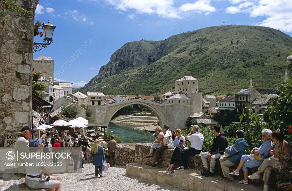 Bosnia Herzegovina, Mostar, 'Stari Most, Old Bridge, Following Reconstruction, Tourists, And Neretva River. Former Yugoslavia'