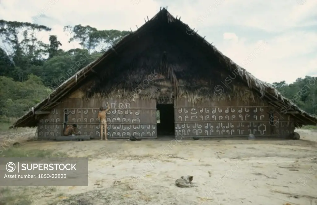 Colombia, North West Amazon, Tukano Indigenous People, Barasana Man Painting Design On Front Of Maloca Or Communal Home Helped By Anthropologist Stephen Hugh-Jones.   Tukano Sedentary Tribe Indian North Western Amazonia Maloca American Colombian Columbia Hispanic Indegent Latin America Latino Male Men Guy South America Tukano Male Man Guy