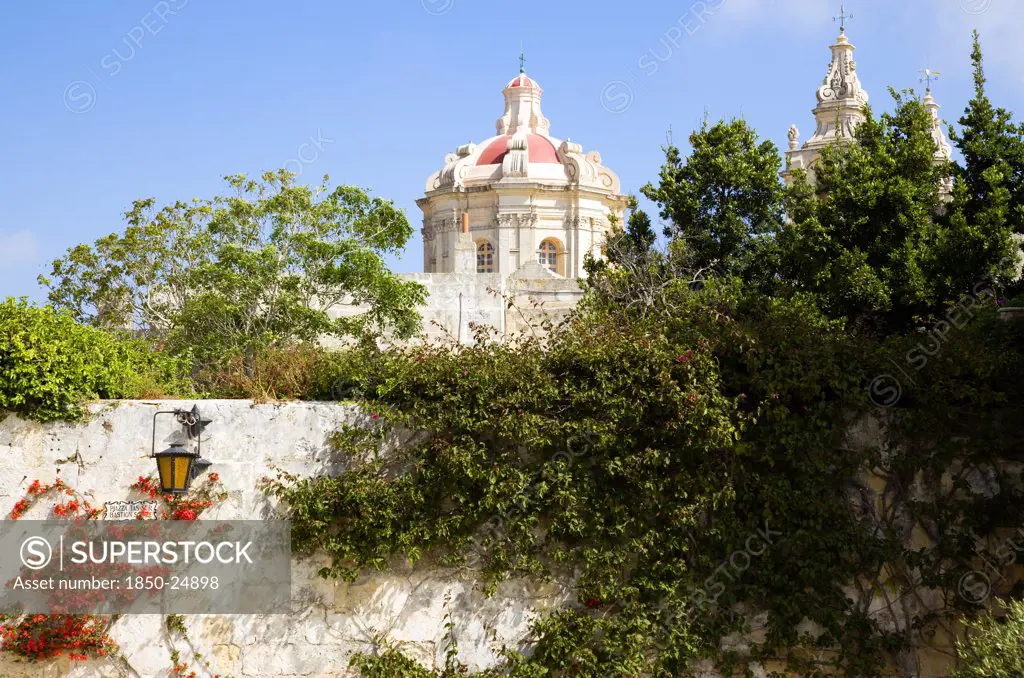 Malta, Mdina, The Silent City. The Dome Of 17Th Century Saint Pauls Cathedral Designed By Architect Lorenzo Gafa Seen From Bastion Square