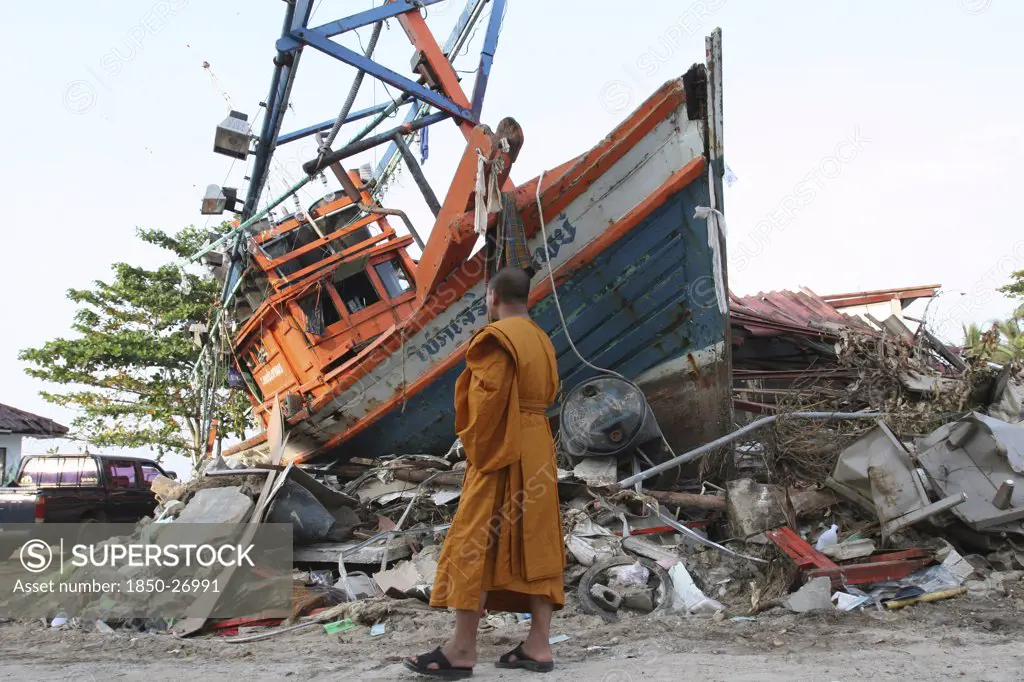 Thailand, Phang Nga District, Nam Khem, 'Tsunami. Monk Looks At The Damage Caused By The Tsunami, Nothing Is Left Standing In The Village 2500 People Are Pressumed Dead. 125Kms North Of Phuket On The 2Nd Jan.'