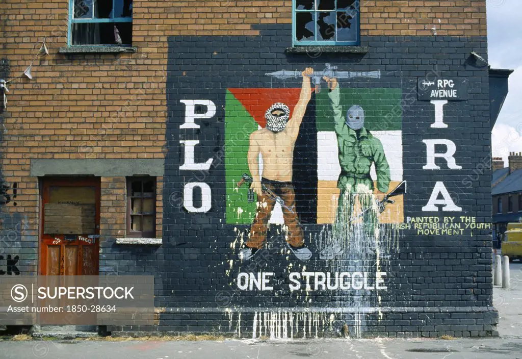 Society, Politics, Nationalist Murals, Plo Ira Irish Republican Mural On The Side Of A Terrace House On The Corner With Falls Road In Belfast.