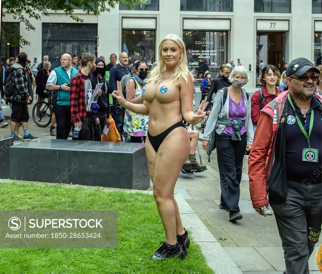 England, London, Laura Amherst, Extinction Rebellion protester from  Brighton topless protest in the City. - SuperStock