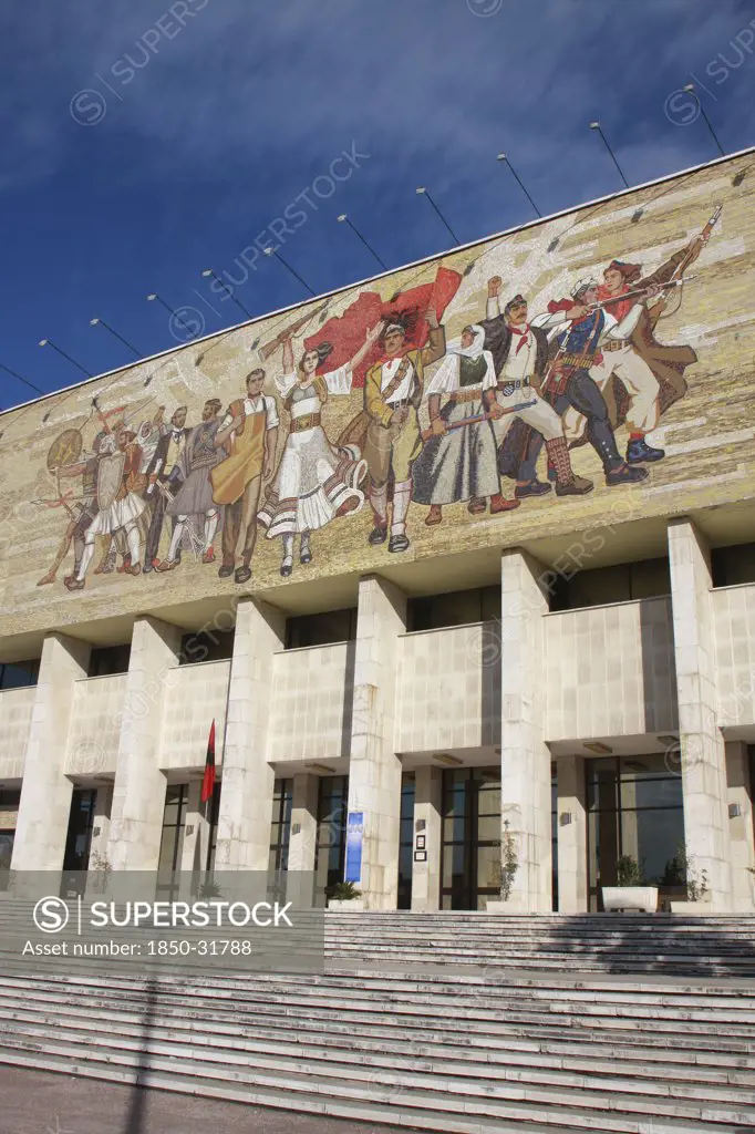 Albania, Tirane, Tirana, National History Museum. Mosaic on the exterior facade of the National History Museum in Skanderbeg Square representing the development of Albanias history.