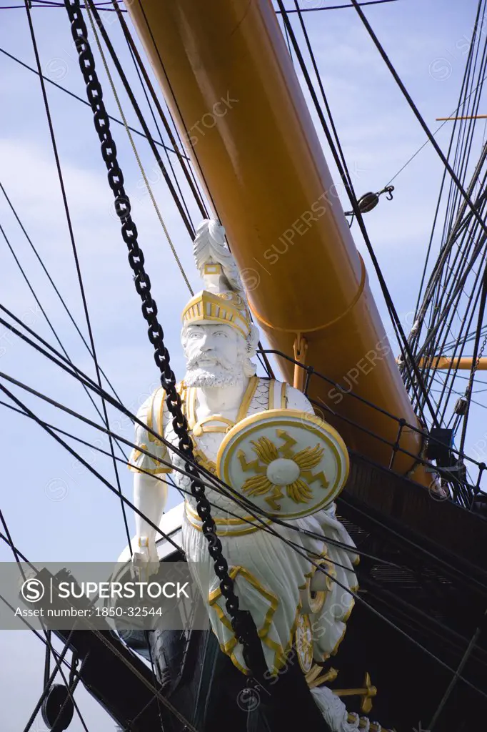 England, Hampshire, Portsmouth, Historic Naval Dockyard Figurehead of HMS Warrior built in 1860 as the first iron hulled sail and steam powered warship.