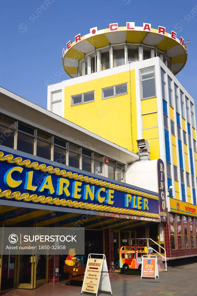 ENGLAND, Hampshire, Portsmouth, Clarence Pier amusement arcade on the seafront in Southsea with fast food Wimpy restaurant on the ground floor.