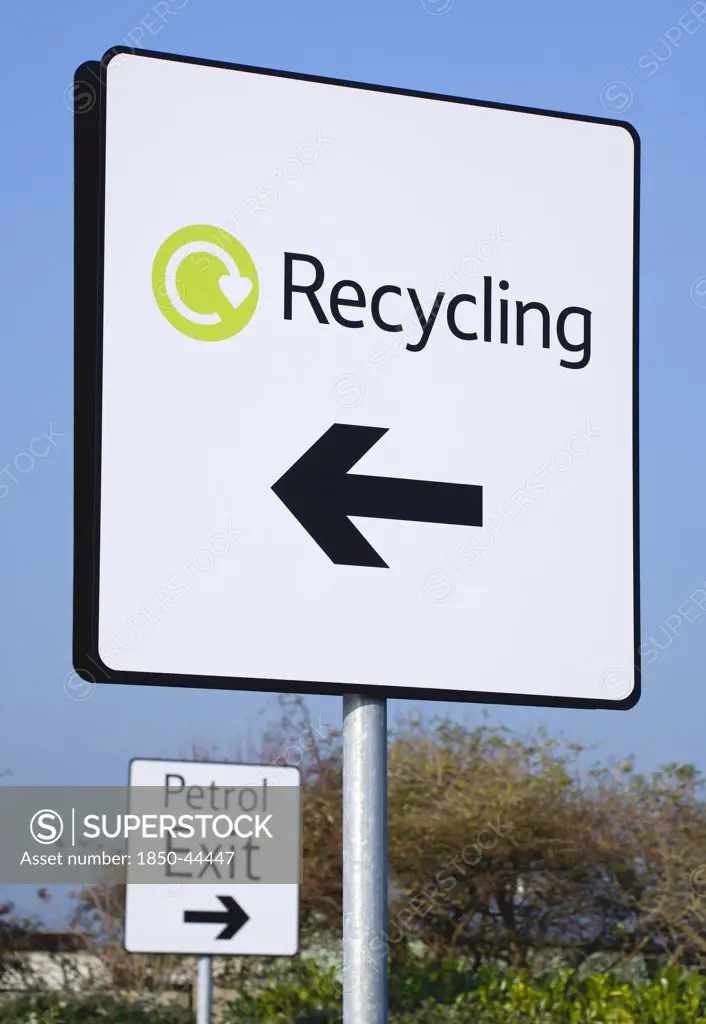 Environment,  Recycling, Sign in supermarket car park.