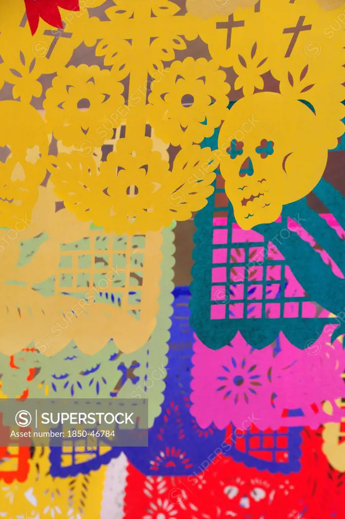 Mexico, Oaxaca, Brightly coloured decorations and symbols for Dia de los Muertos or Day of the Dead festivities.