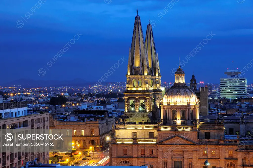 Mexico, Jalisco, Guadalajara, View of Cathedral and city at night.