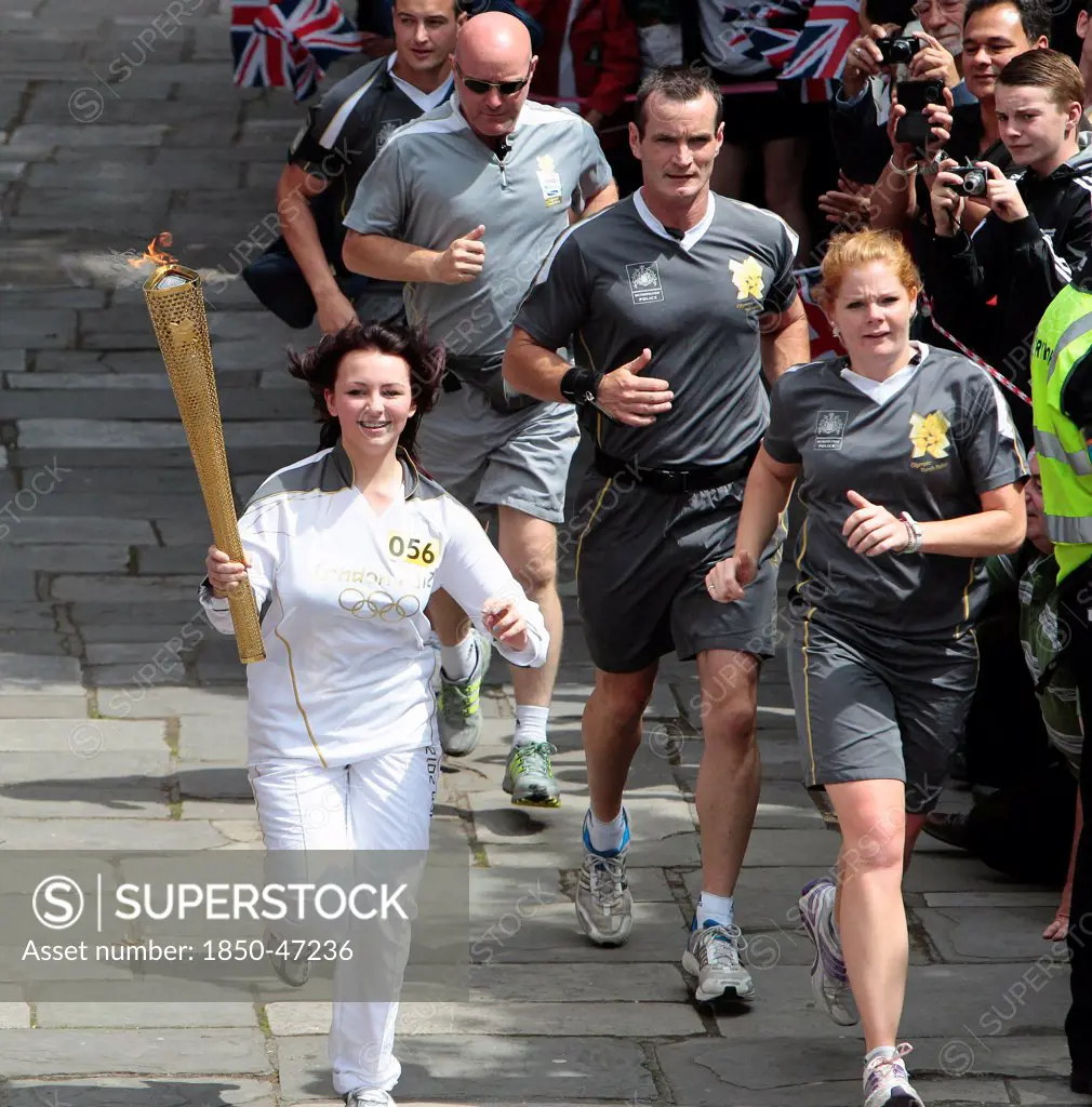 England, Kent, Tunbridge Wells, Olympic Torch relay running through the Pantiles.