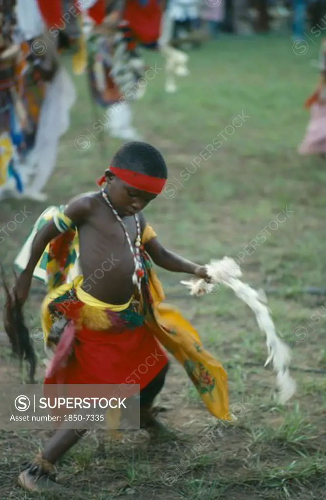 Nigeria, Festivals, Young Igbo Boy In Traditional Dress Dancing