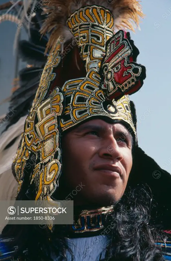 Mexico, Mexico City, Our Lady Of Guadaloupe Festival Male Indian Dancer Outside The Basilica