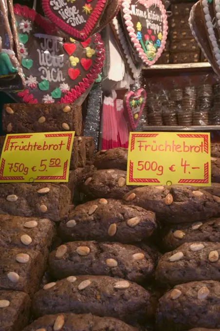 Germany, Bavaria, Nuremberg, 'Stall Selling Fruchtebrot And Lebkuchen, Traditional German Festive Food, In The Christmas Market In Hauptmarkt.'